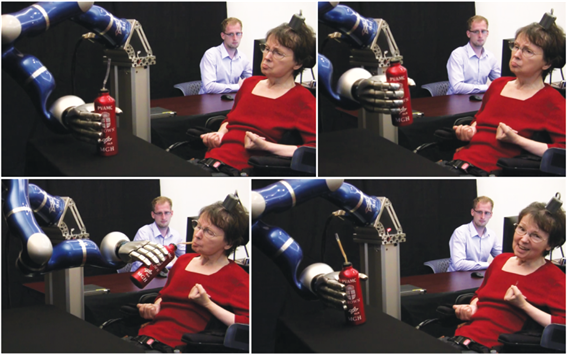 그림 1. 사지마비 환자가 BCI 기술을 이용해 자신의 생각으로 로봇팔을 제어해 음료수를 마시고 있다. (Hochberg et al., 2012 Nature)