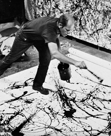 Jackson Pollock painting in his studio on Long Island, New York, 1950. ©Hans Namuth